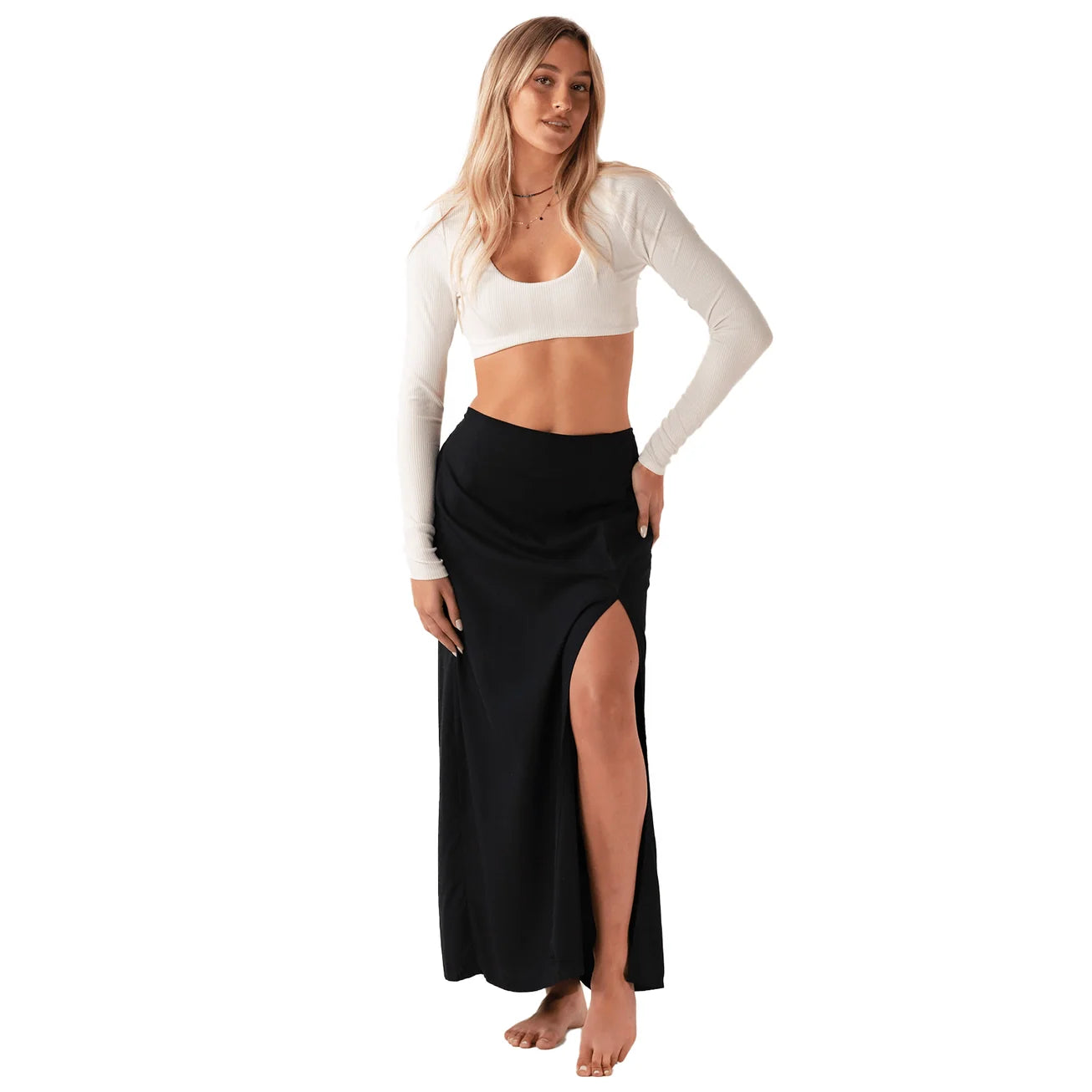 Black maxi skirt with structured drape and durable rayon fabric.