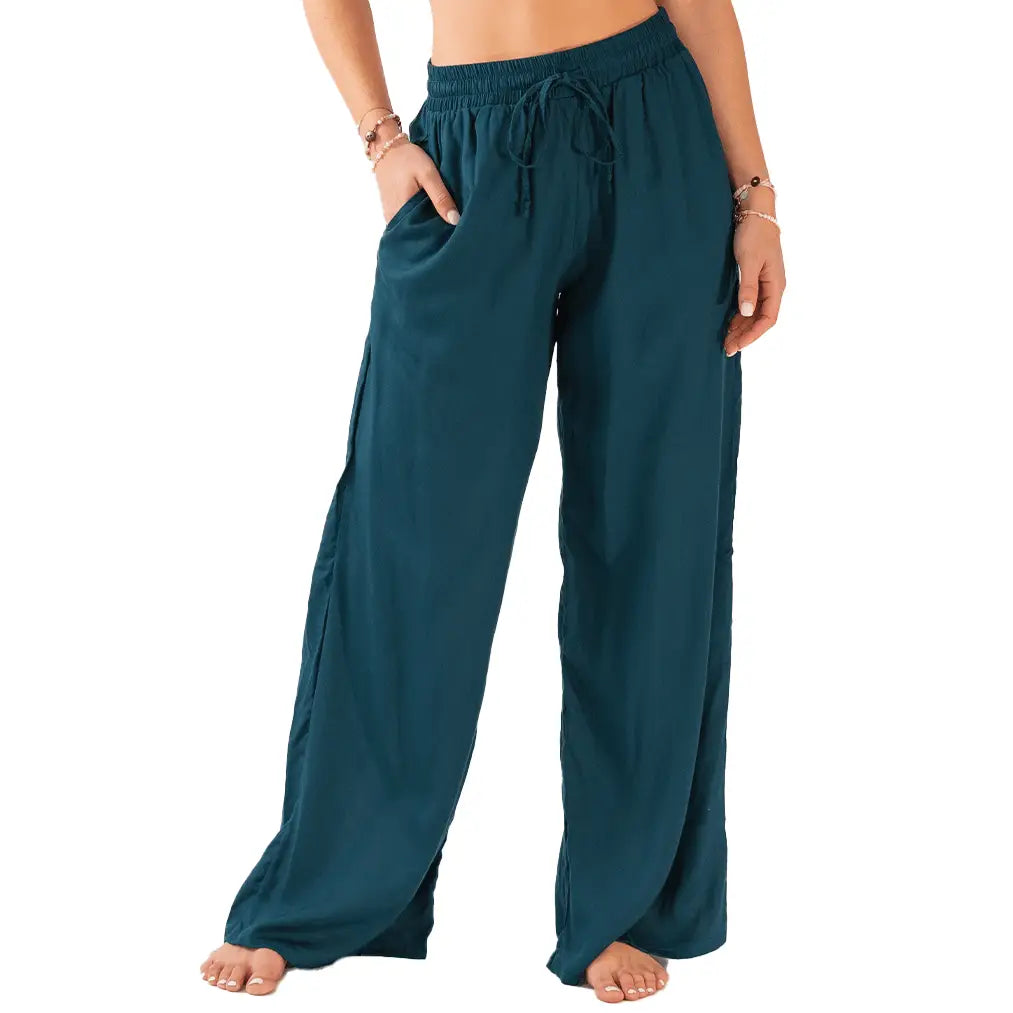 Deep teal wide leg drawstring pants with elastic waist and pockets.